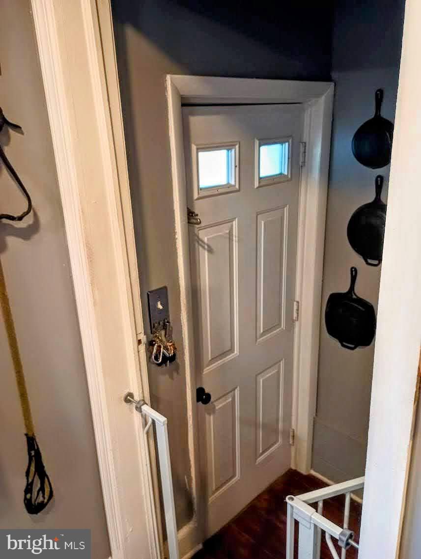 219 Front Street Fieldsboro, NJ 08505 - Photo 14 of 48 a view of a hallway with wooden floor and windows