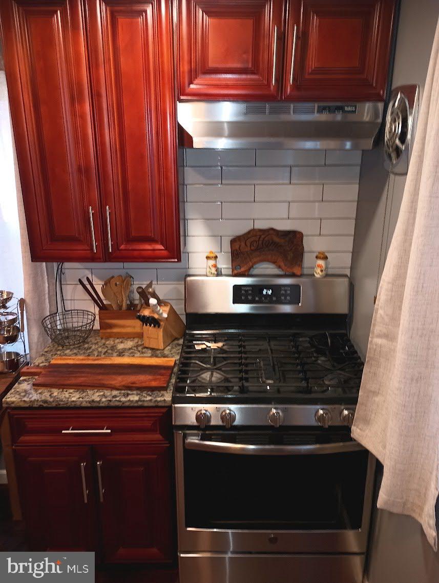 219 Front Street Fieldsboro, NJ 08505 - Photo 16 of 48 a stove top oven sitting inside of a kitchen