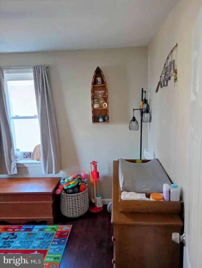 219 Front Street Fieldsboro, NJ 08505 - Photo 21 of 48 a living room with a couch and a window