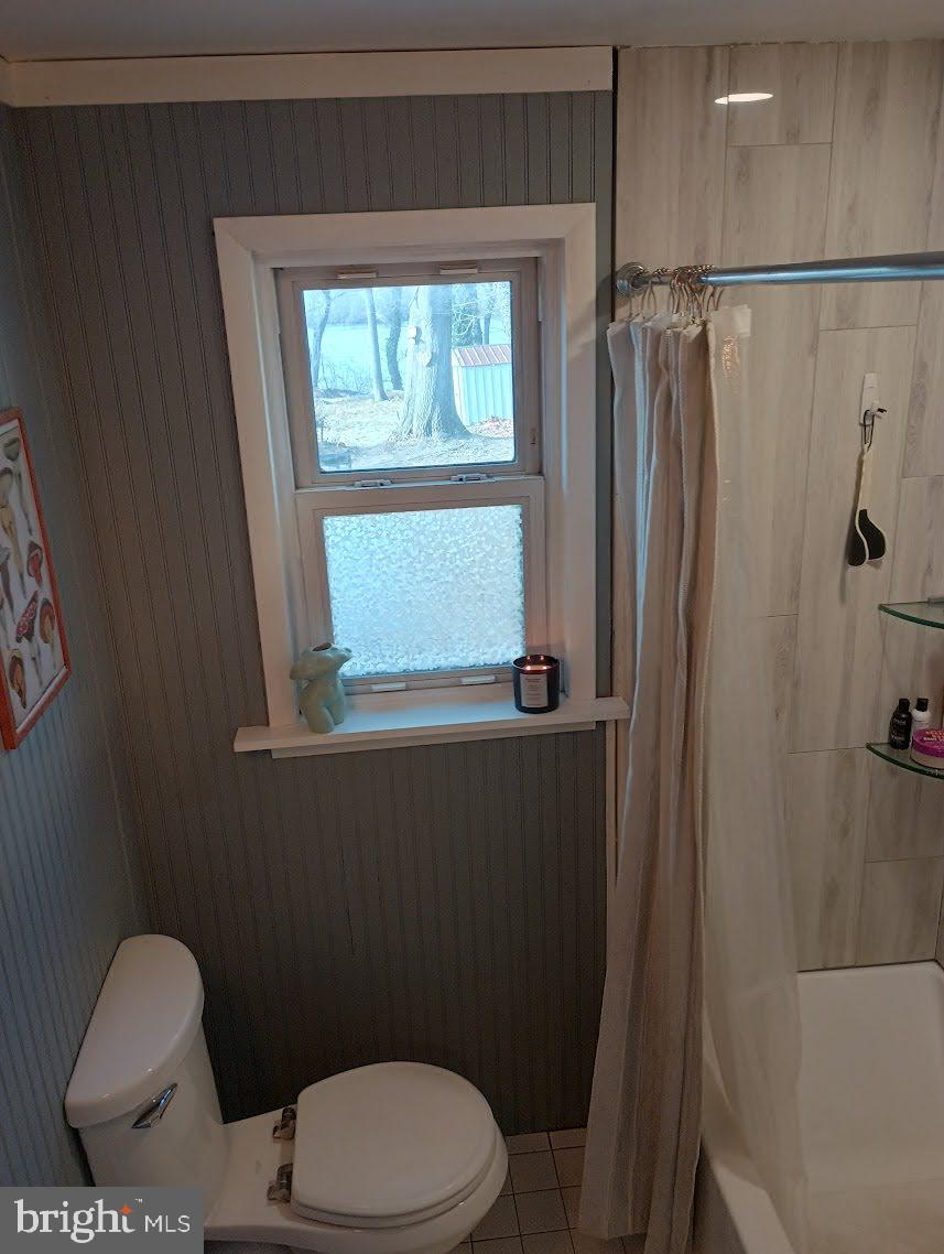 219 Front Street Fieldsboro, NJ 08505 - Photo 27 of 48 a bathroom with a toilet and a shower