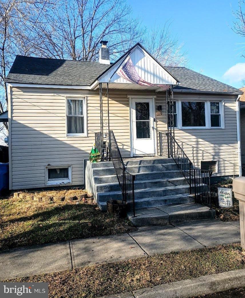 219 Front Street Fieldsboro, NJ 08505 - Photo 3 of 48 a front view of a house with stairs