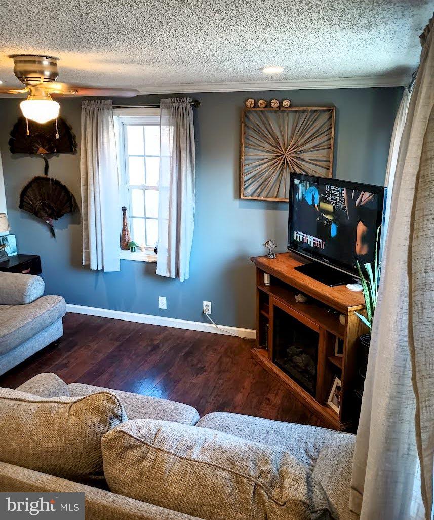 219 Front Street Fieldsboro, NJ 08505 - Photo 7 of 48 a living room with furniture and a fireplace