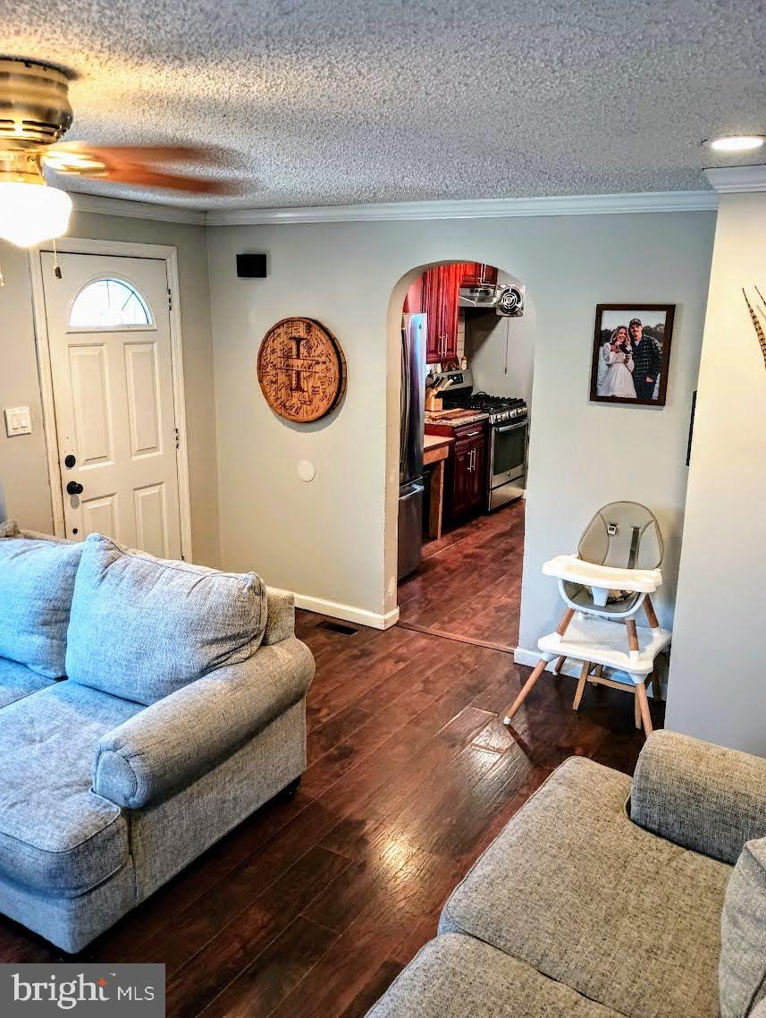 219 Front Street Fieldsboro, NJ 08505 - Photo 9 of 48 a living room with furniture and a wooden floor