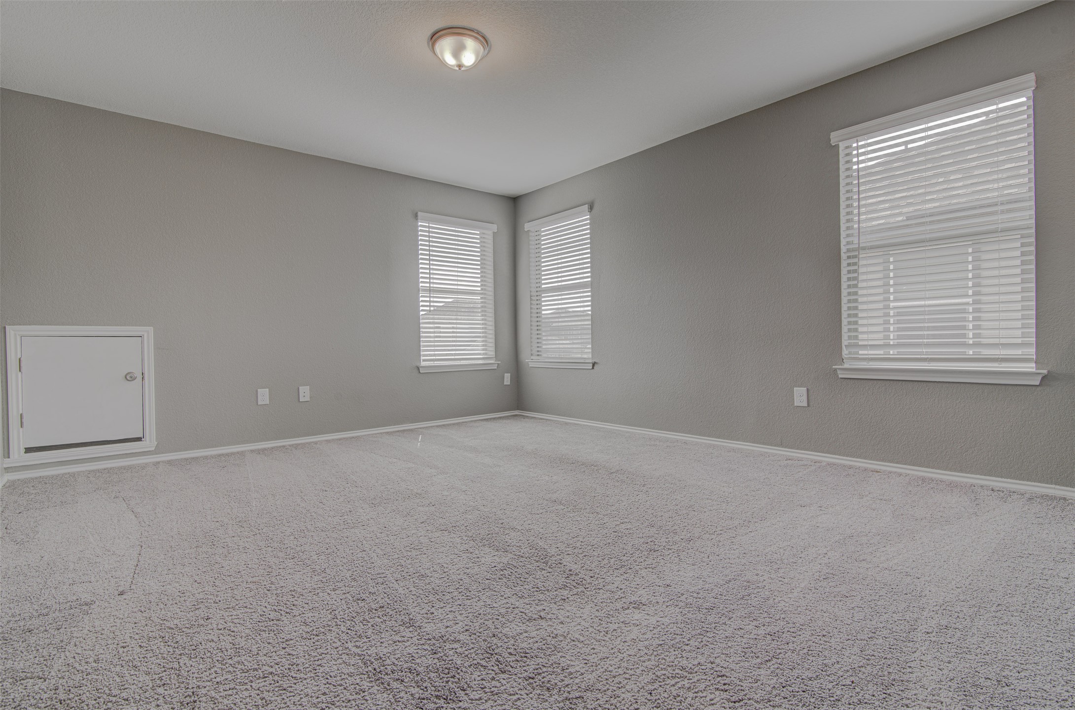 1916 Dragonfly Loop Bastrop, TX 78602 - Photo 18 of 33 an empty room with windows
