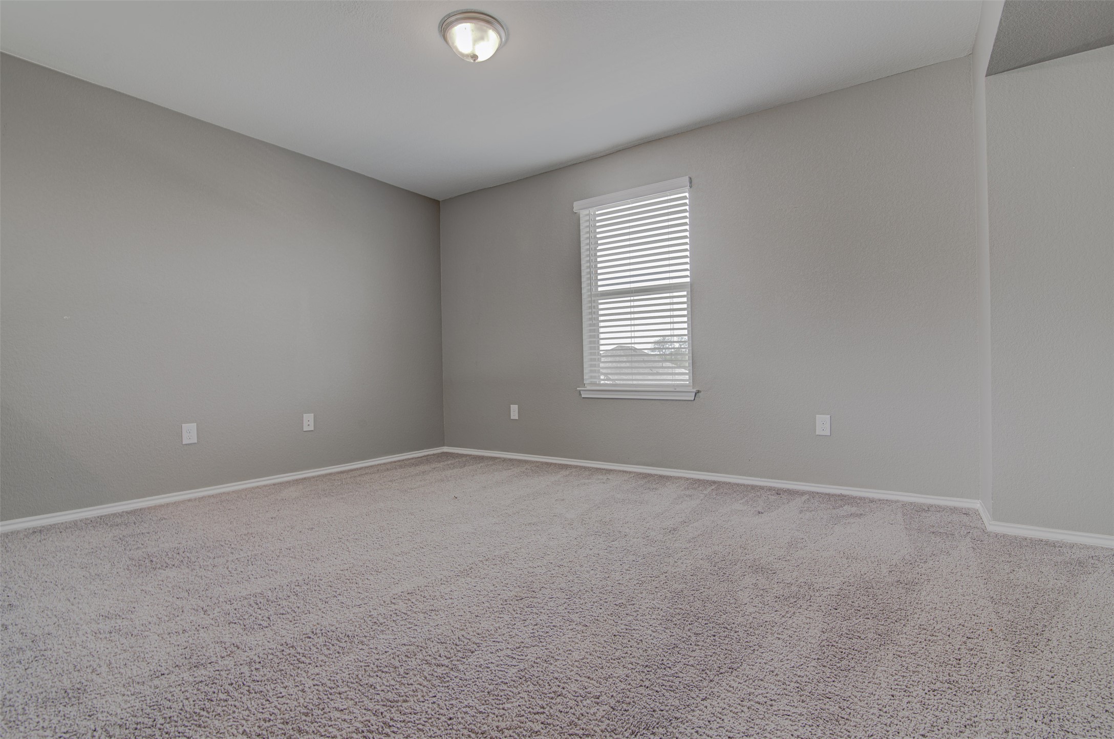1916 Dragonfly Loop Bastrop, TX 78602 - Photo 27 of 33 an empty room with a window