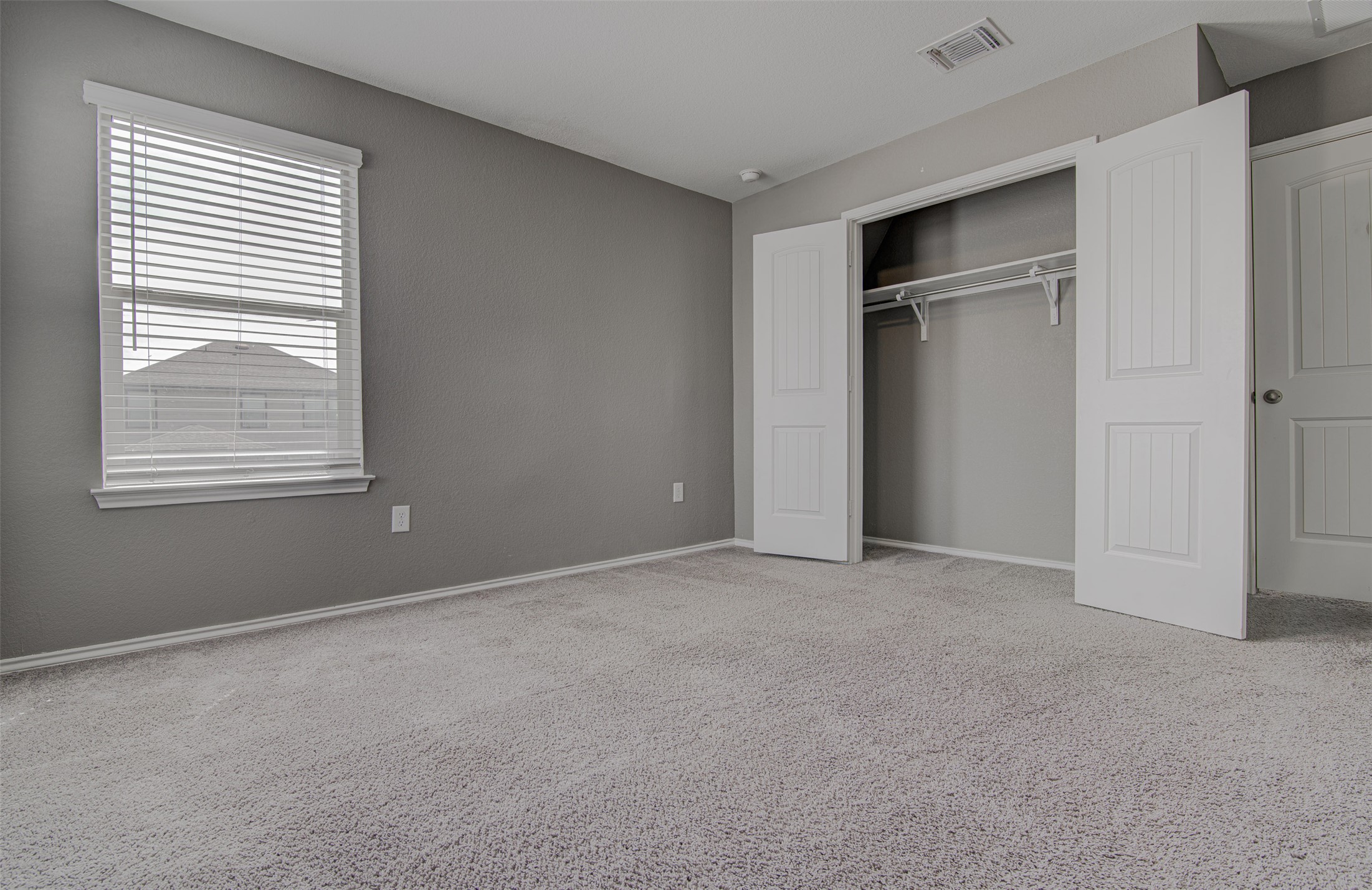 1916 Dragonfly Loop Bastrop, TX 78602 - Photo 28 of 33 a view of an empty room with a window