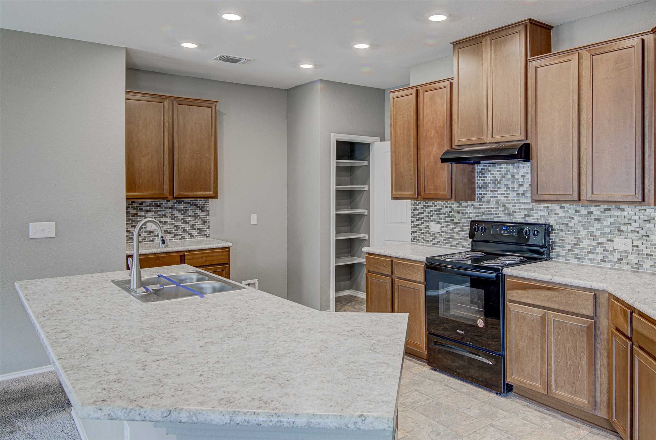 1916 Dragonfly Loop Bastrop, TX 78602 - Photo 4 of 33 a bedroom with a bed and furniture