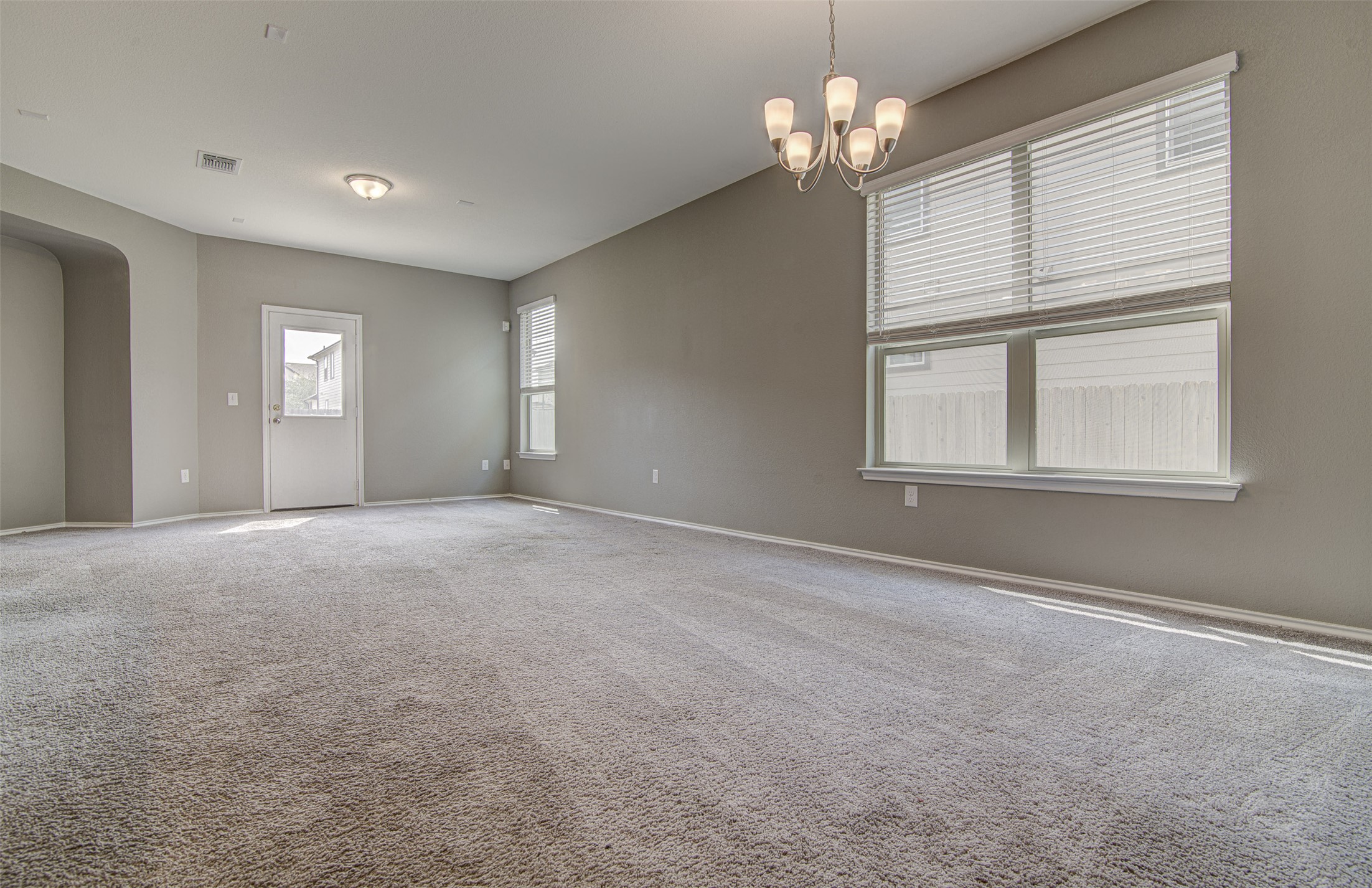 1916 Dragonfly Loop Bastrop, TX 78602 - Photo 8 of 33 a view of an empty room with a window