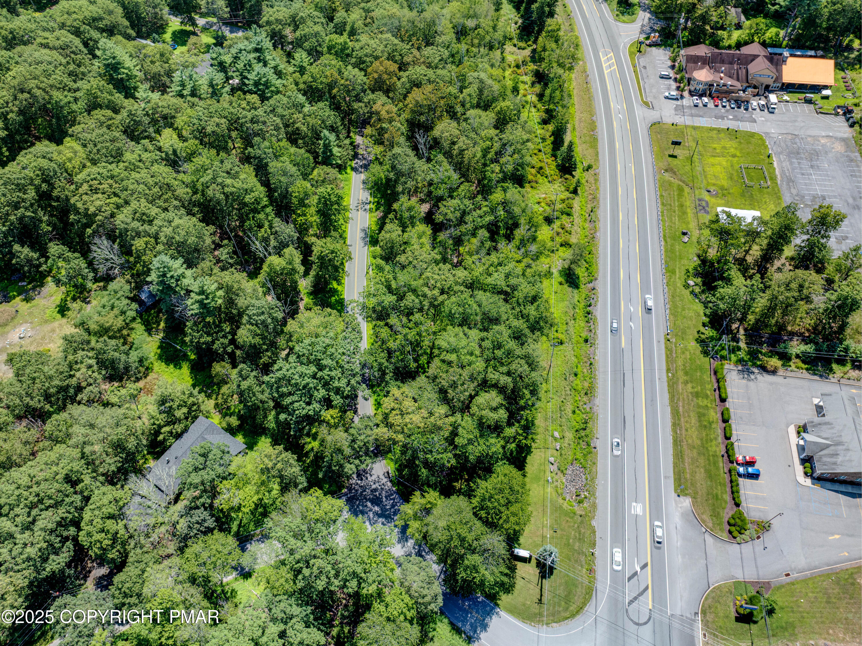 53 Rock Lane Swiftwater, PA 18370 - Photo 2 of 7 an aerial view of a residential houses with yard