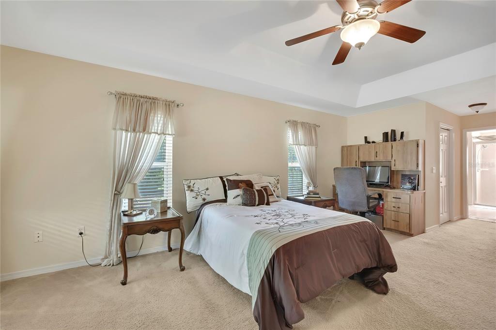 15157 Duck Hawk Road Weeki Wachee, FL 34614 - Photo 19 of 48 a bedroom with a bed gym equipment and a window