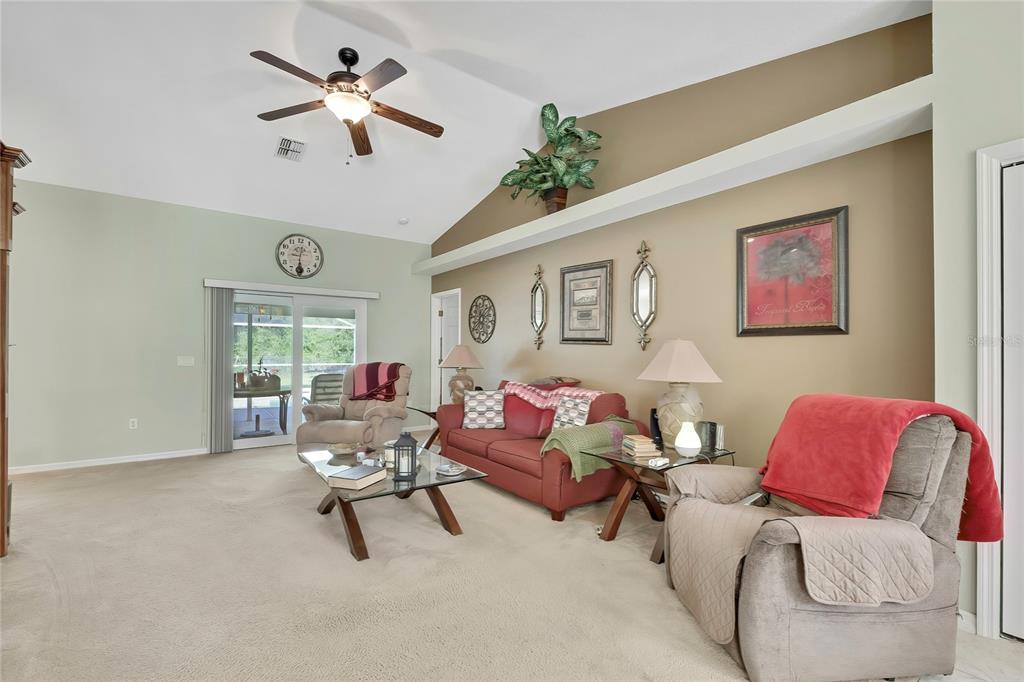 15157 Duck Hawk Road Weeki Wachee, FL 34614 - Photo 4 of 48 a living room with furniture