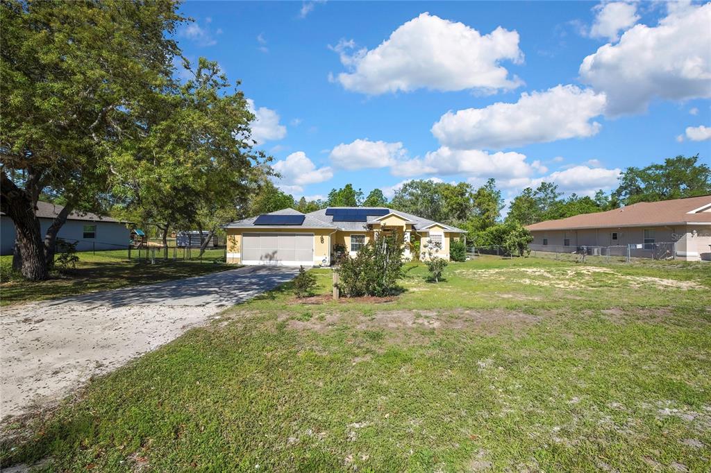 15157 Duck Hawk Road Weeki Wachee, FL 34614 - Photo 47 of 48 a view of a house with a yard
