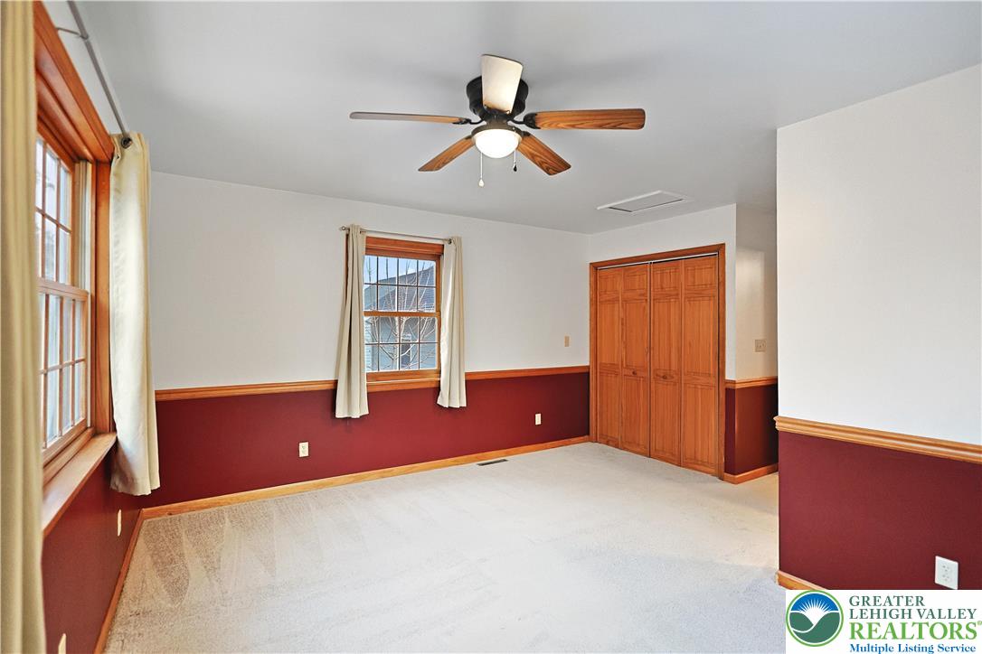337 West Main Street Bath, PA 18014 - Photo 17 of 32 a room with window and ceiling fan