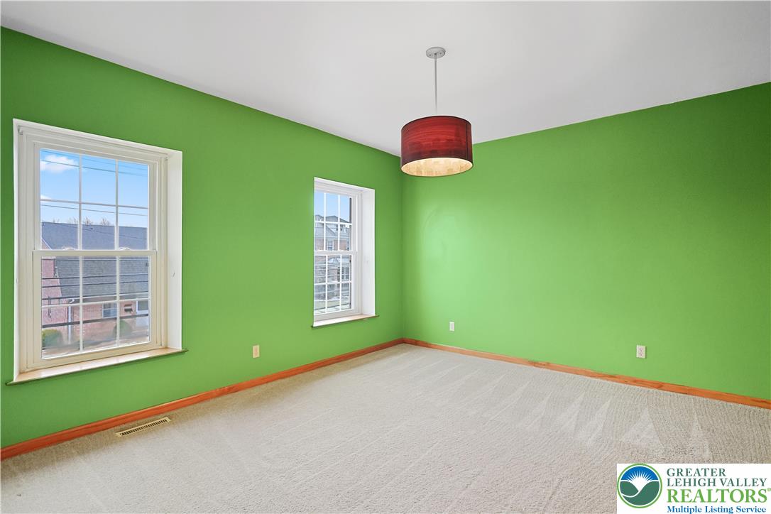 337 West Main Street Bath, PA 18014 - Photo 21 of 32 a view of an empty room with a window and a kitchen