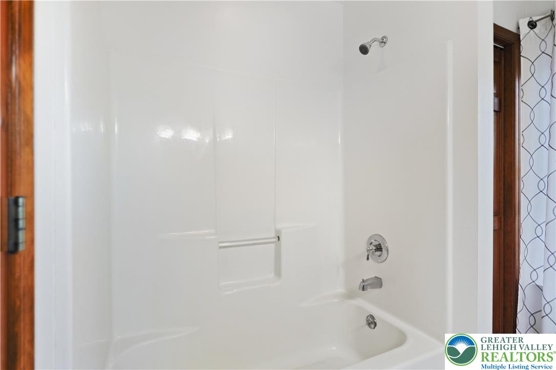 337 West Main Street Bath, PA 18014 - Photo 24 of 32 a bathroom with a bathtub