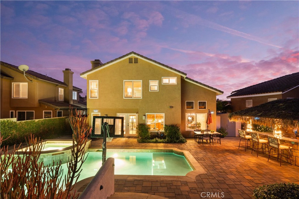 23 Yellowpine Lane Trabuco Canyon, CA 92679 - Photo 15 of 22 a view of swimming pool in front of residential houses with yard
