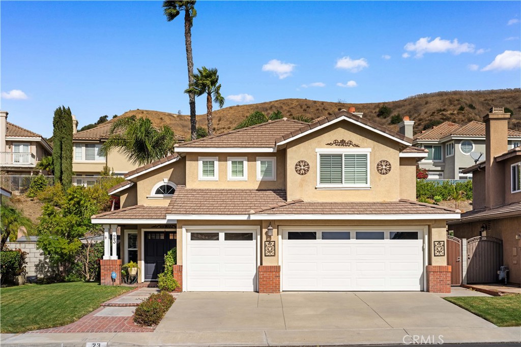 23 Yellowpine Lane Trabuco Canyon, CA 92679 - Photo 5 of 22 a front view of a house with garden
