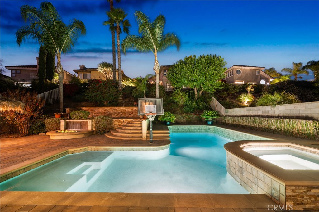 23 Yellowpine Lane Trabuco Canyon, CA 92679 - Photo 8 of 22 a view of swimming pool with outdoor seating and yard