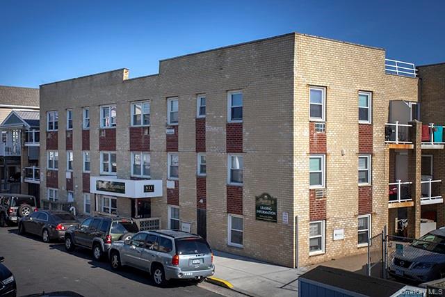 a car parked in front of a building