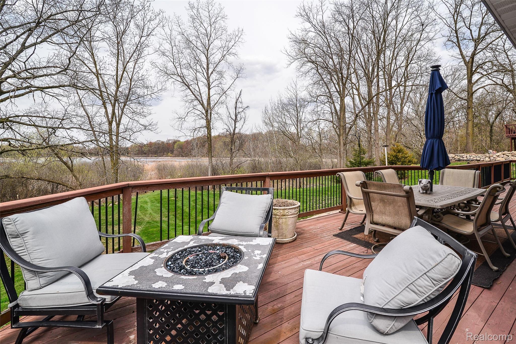 4184 Bauer Road Brighton, MI 48116 - Photo 10 of 51 Huge Deck with Private Views and Nature Surrounding