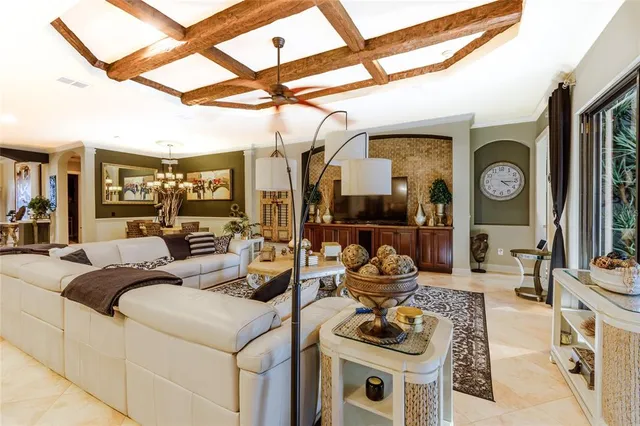 a living room with furniture and windows