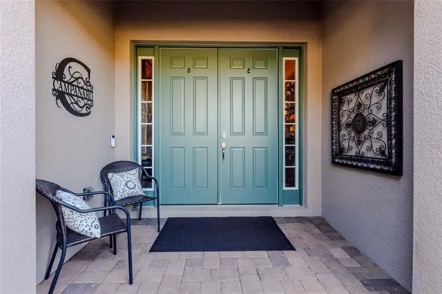 a living room with furniture and a rug