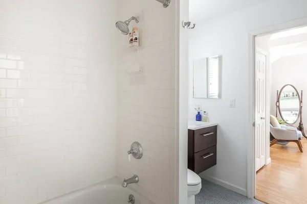 a bathroom with a toilet and a sink