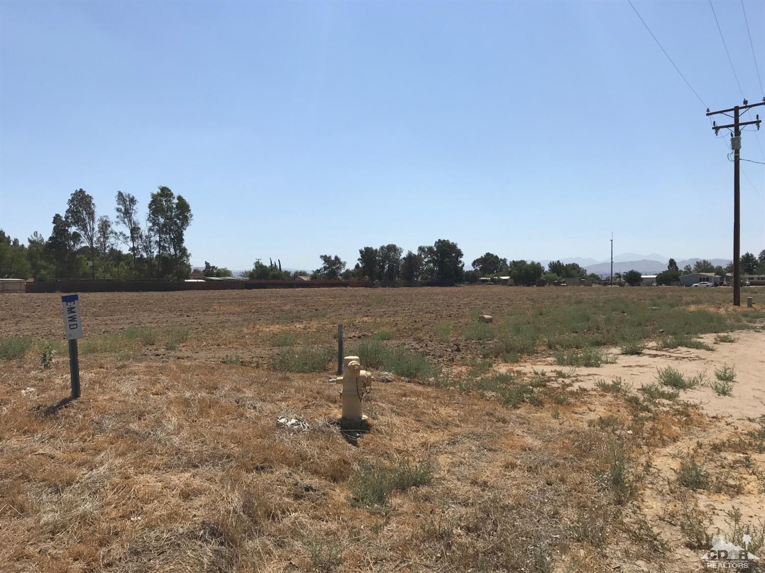 0 Santa Rosa Road Menifee, CA 92585 - Photo 5 of 7 a view of a lake with houses in the back