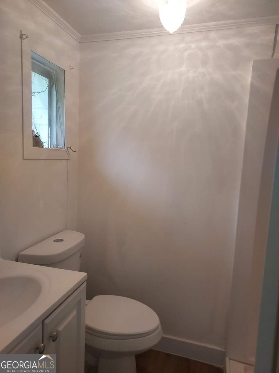 514 Phillips Road Warm Springs, GA 31830 - Photo 11 of 36 a white toilet sitting next to a white sink