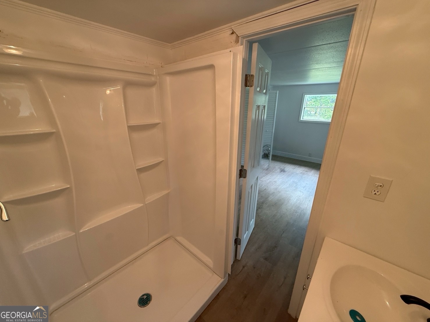 514 Phillips Road Warm Springs, GA 31830 - Photo 23 of 36 a bathroom with a tub and shower