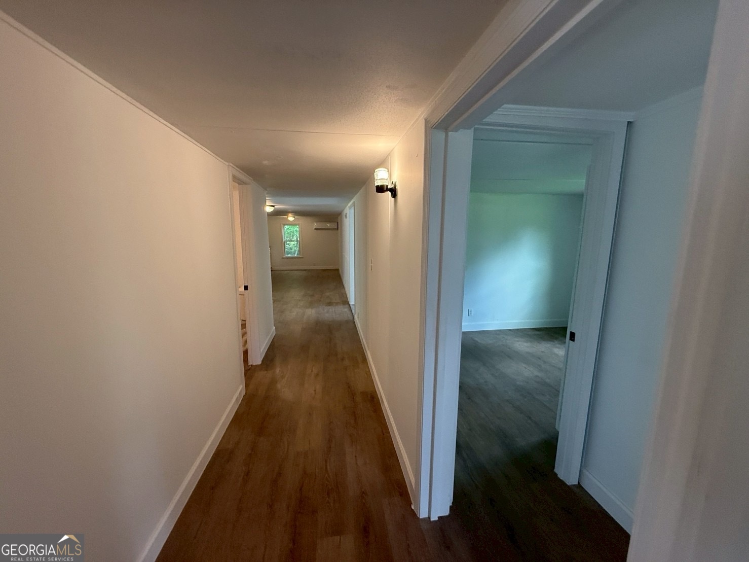 514 Phillips Road Warm Springs, GA 31830 - Photo 28 of 36 a view of a hallway with a wooden floor