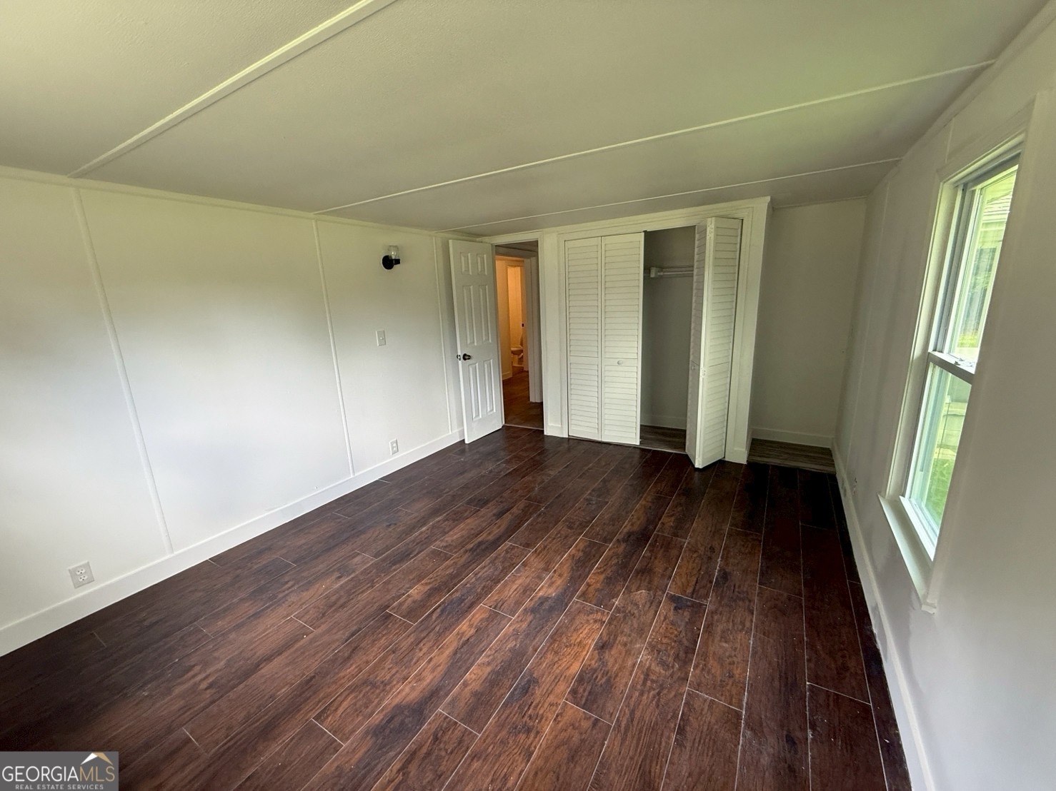 514 Phillips Road Warm Springs, GA 31830 - Photo 30 of 36 a view of a room with wooden floor and stairs