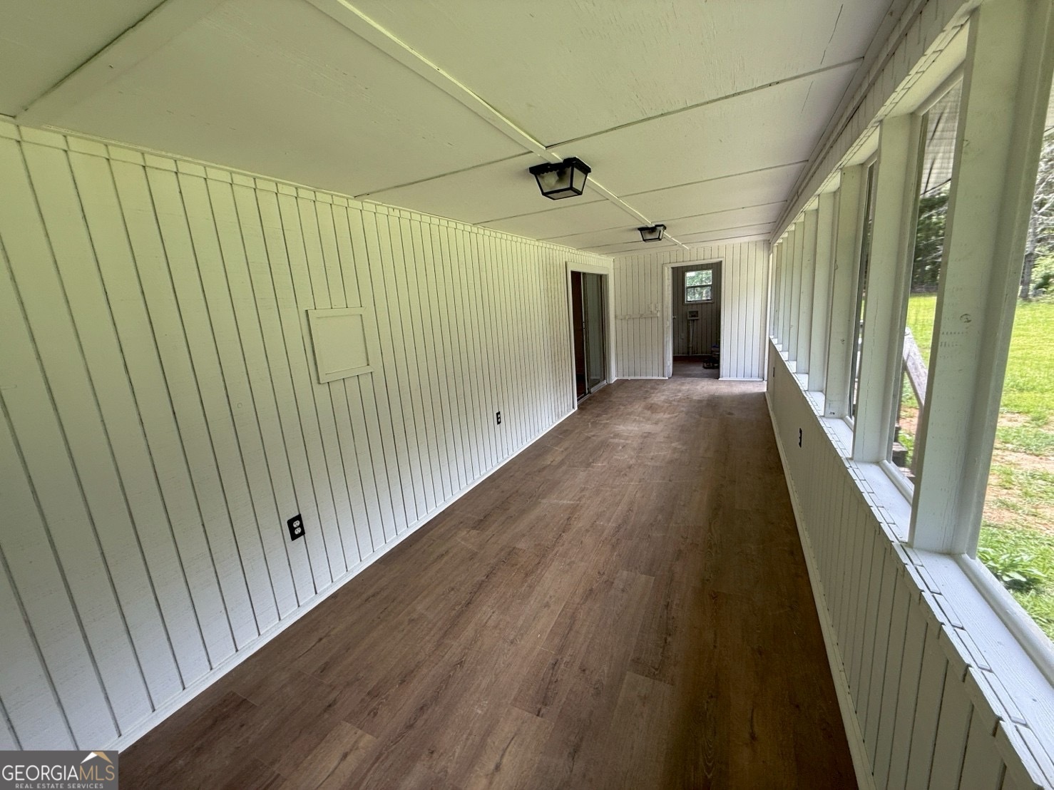 514 Phillips Road Warm Springs, GA 31830 - Photo 32 of 36 a view of a hallway with wooden floor