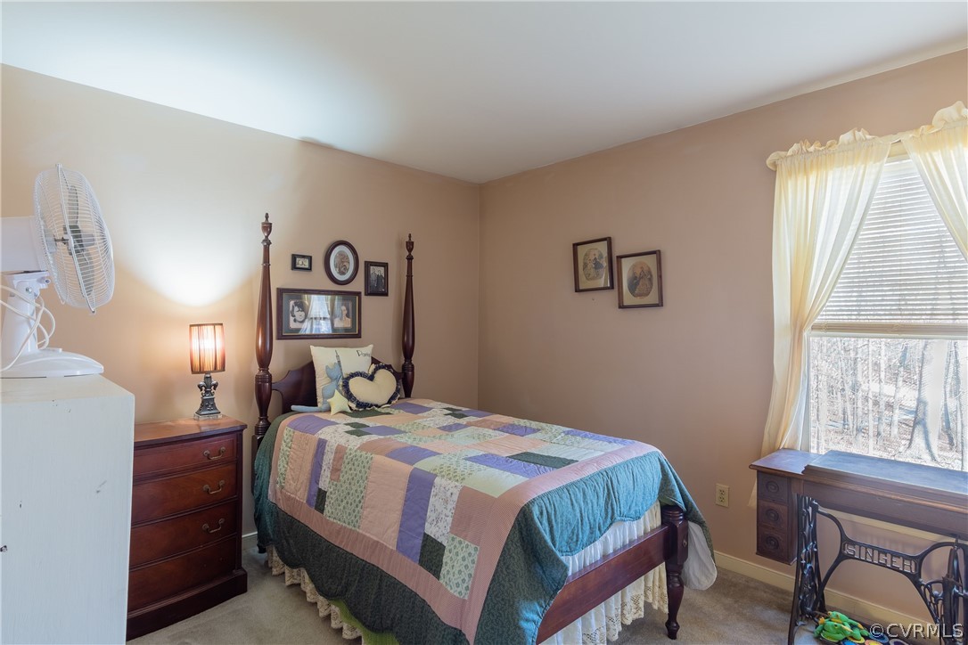4956 Shannon Road Kents Store, VA 23084 - Photo 11 of 21 a bedroom with a bed and a window