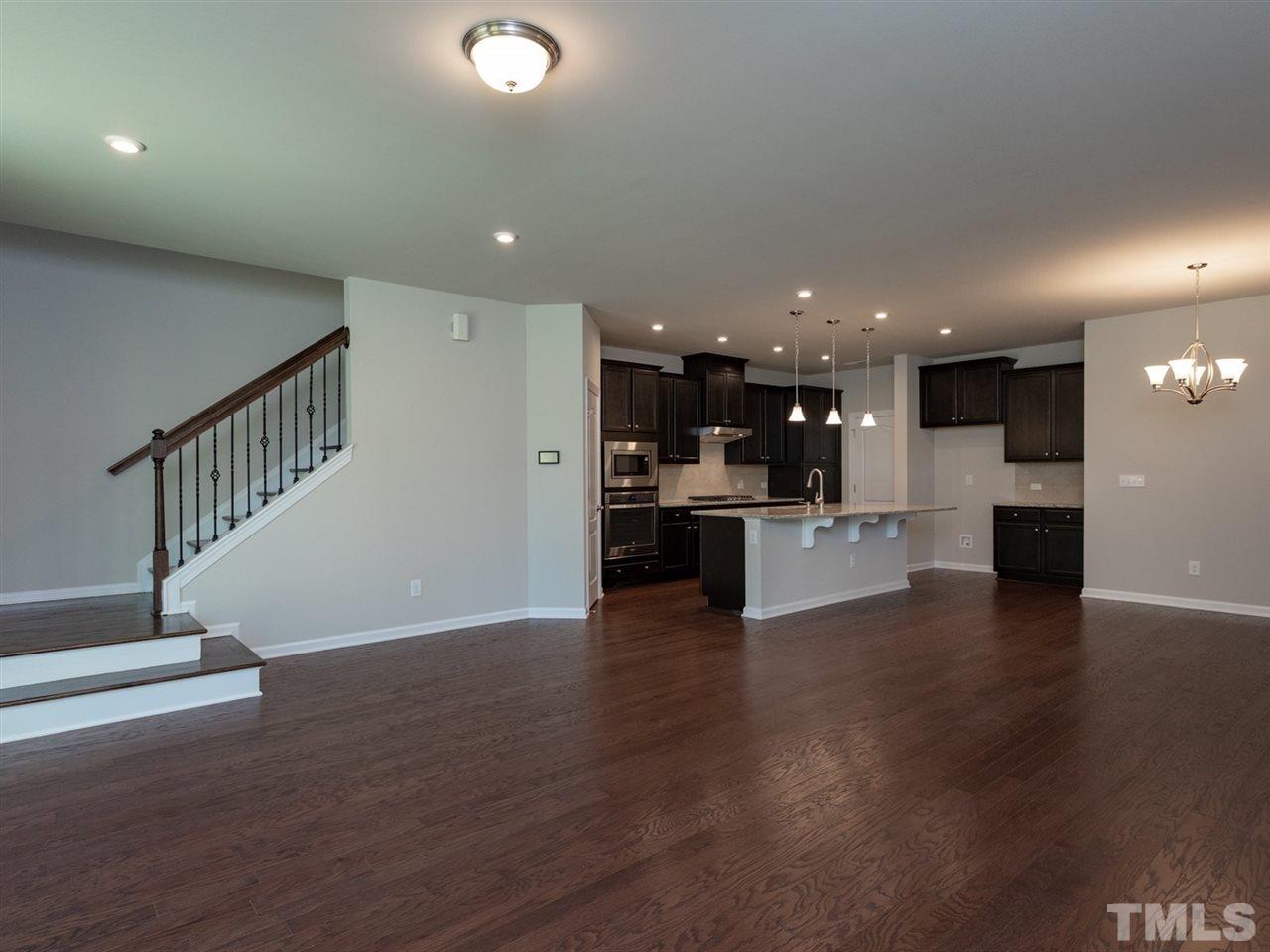 845 Rymark Court Cary, NC 27513 - Photo 13 of 21 a view of kitchen with kitchen island and stainless steel appliances