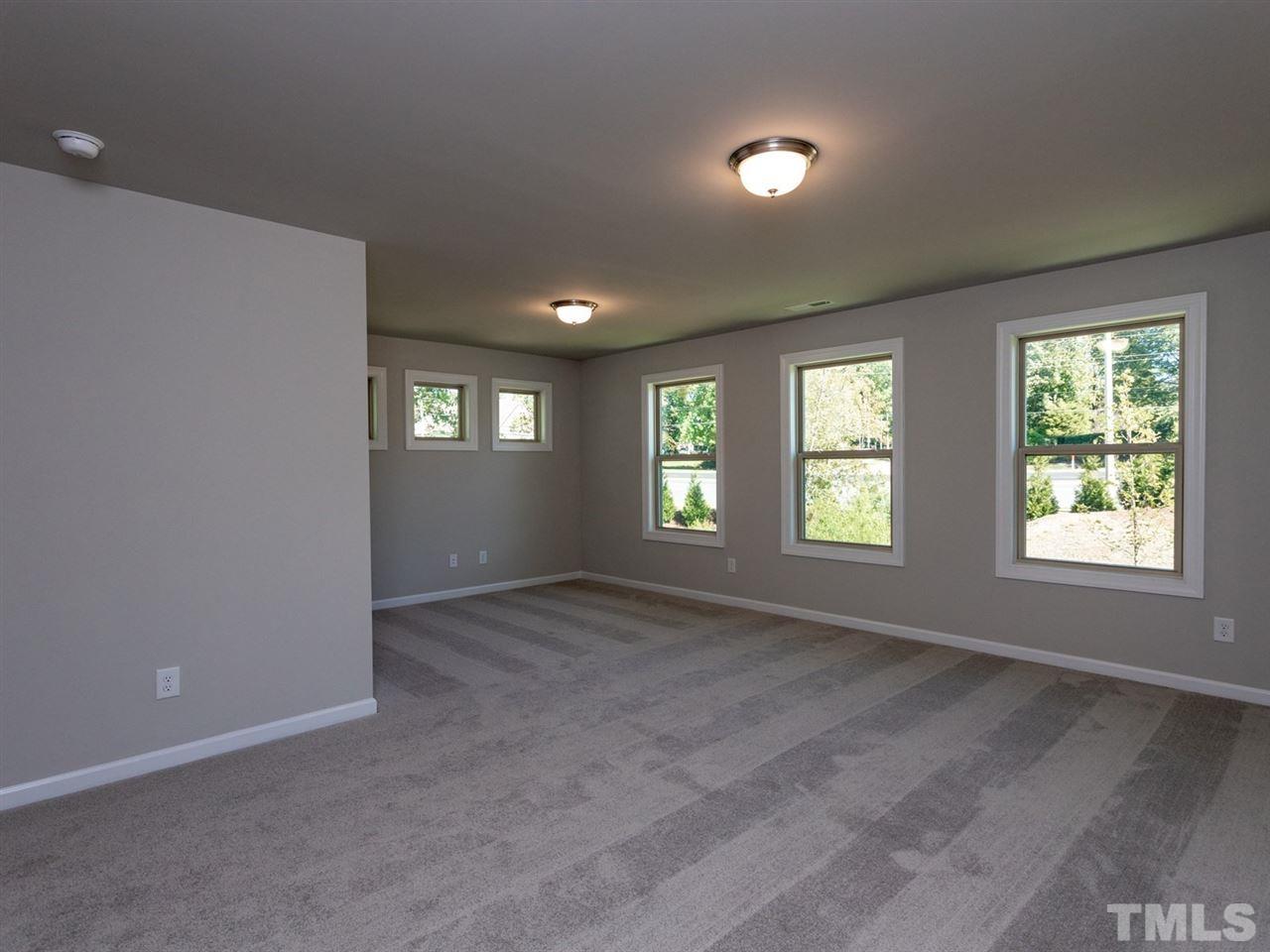 845 Rymark Court Cary, NC 27513 - Photo 14 of 21 a view of an empty room with a window