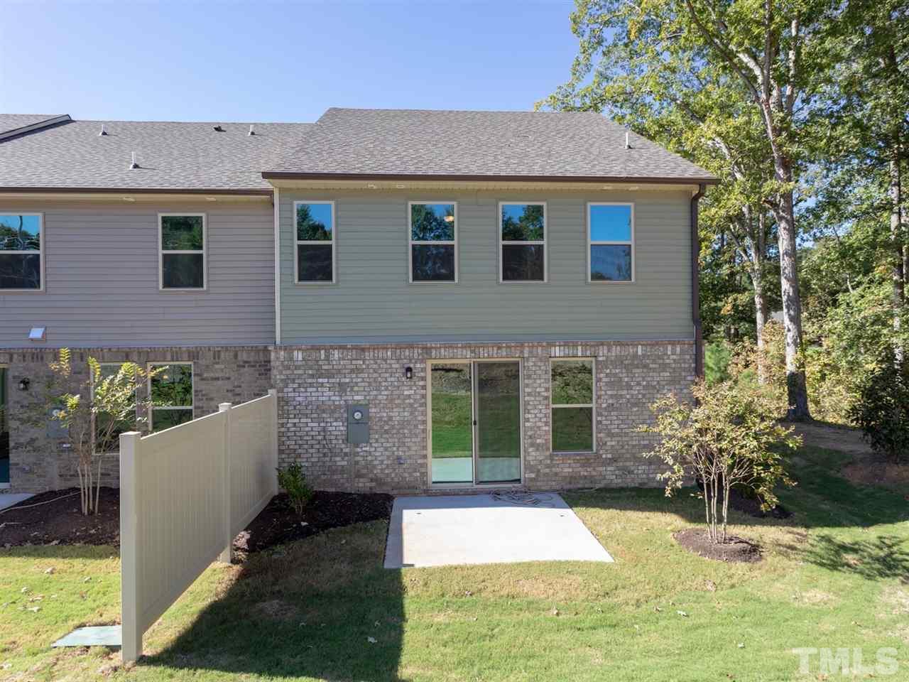 845 Rymark Court Cary, NC 27513 - Photo 18 of 21 a view of a house with garden