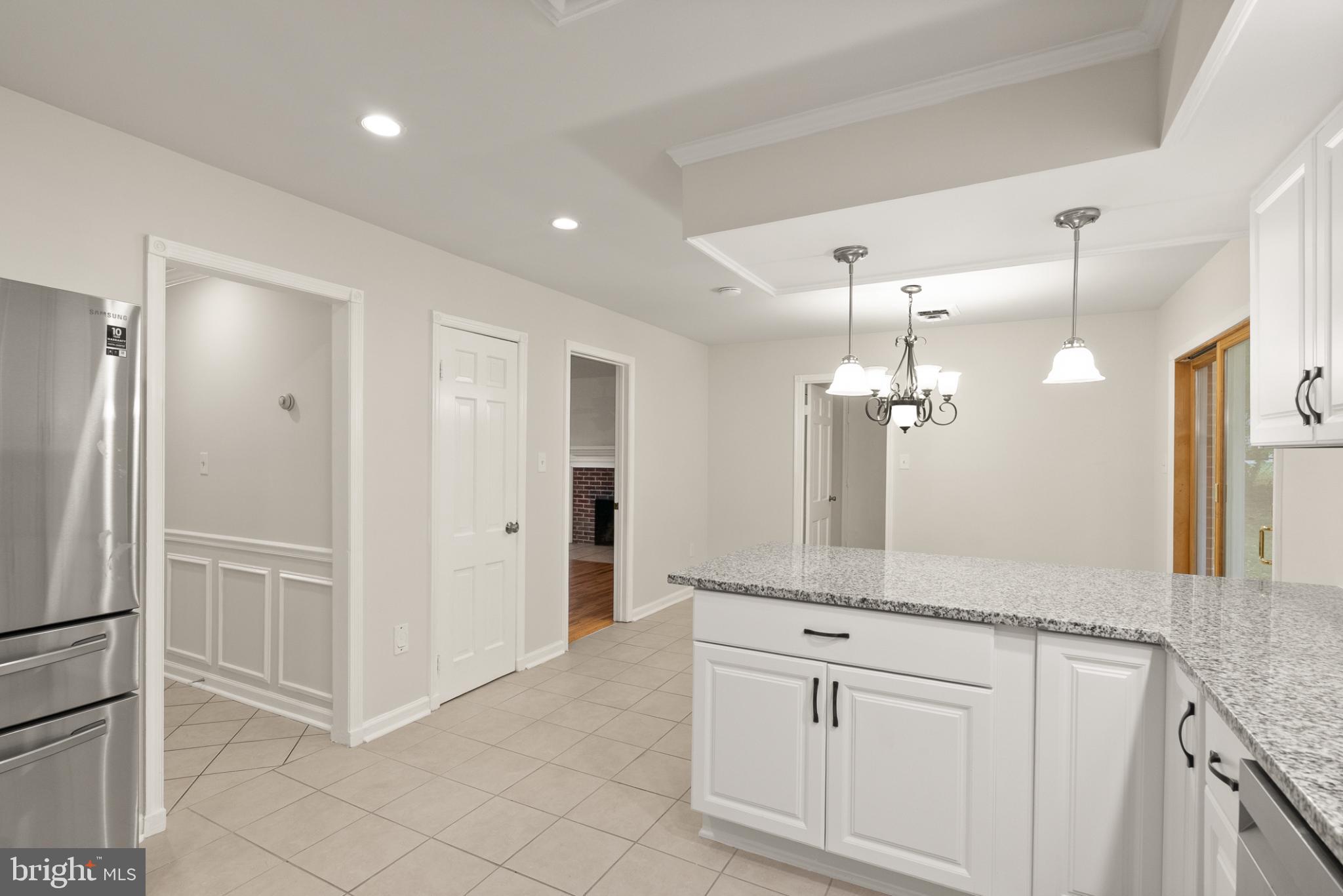 7075 Yates Ford Road Manassas, VA 20111 - Photo 16 of 54 Modern kitchen with elegant finishes.