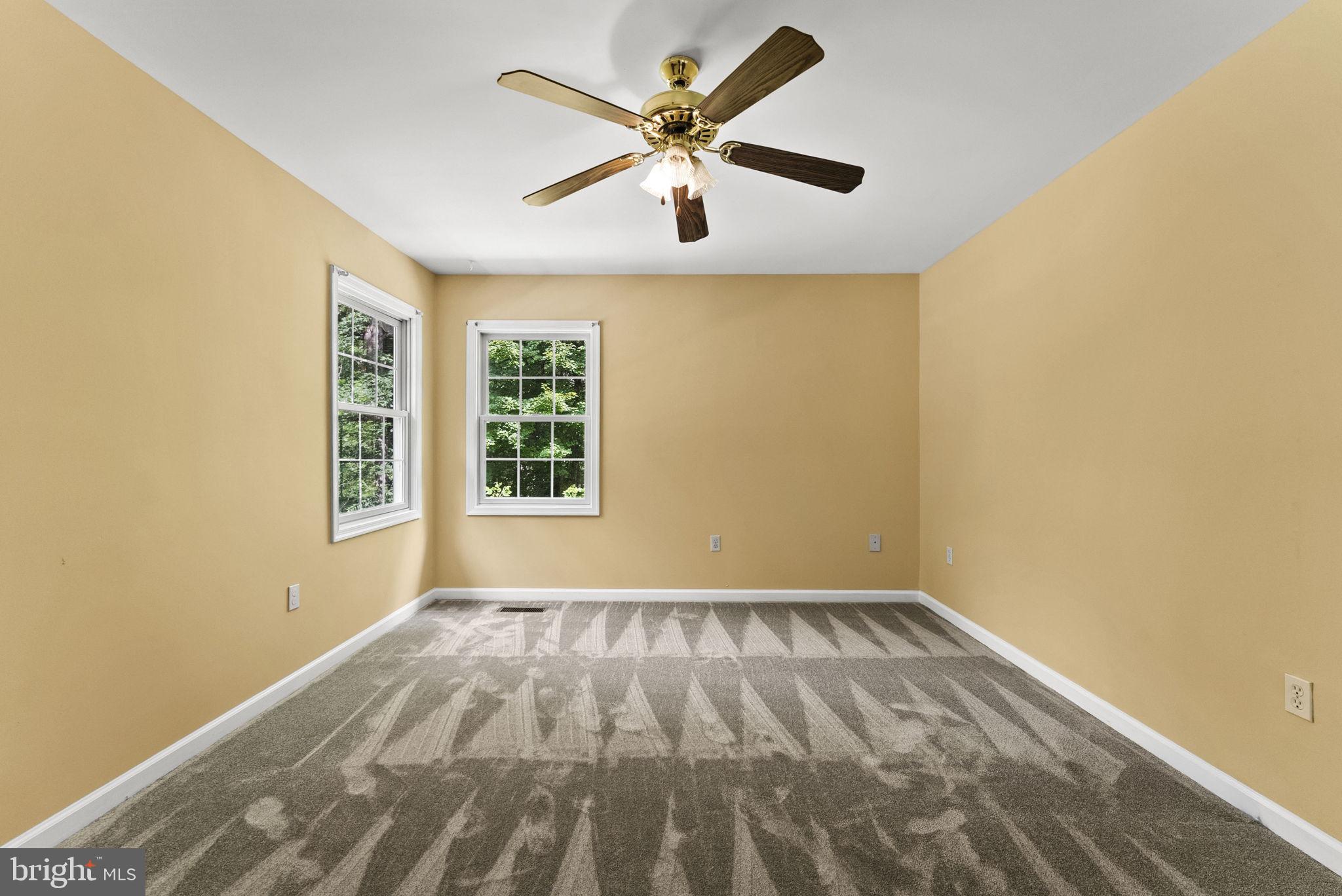 20065 Crooked Run Road Culpeper, VA 22701 - Photo 23 of 62 wooden floor in an empty room with a window