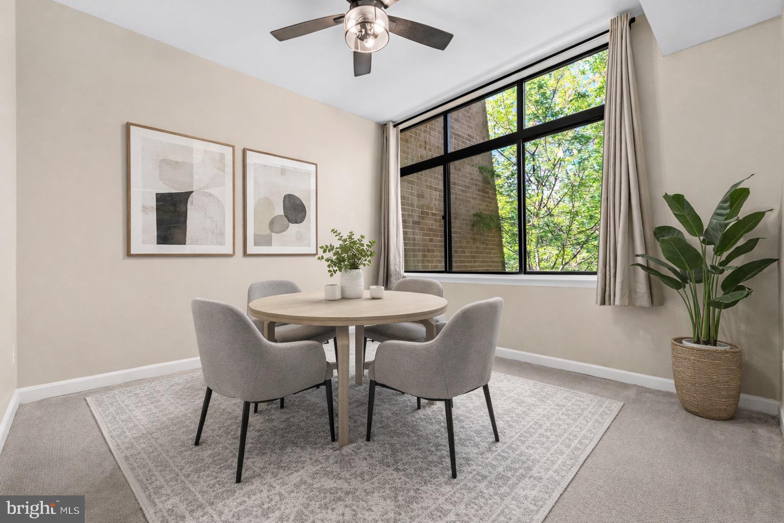 2116 Green Watch Way, Unit 200D Reston, VA 20191 - Photo 11 of 38 a dining room with furniture and window