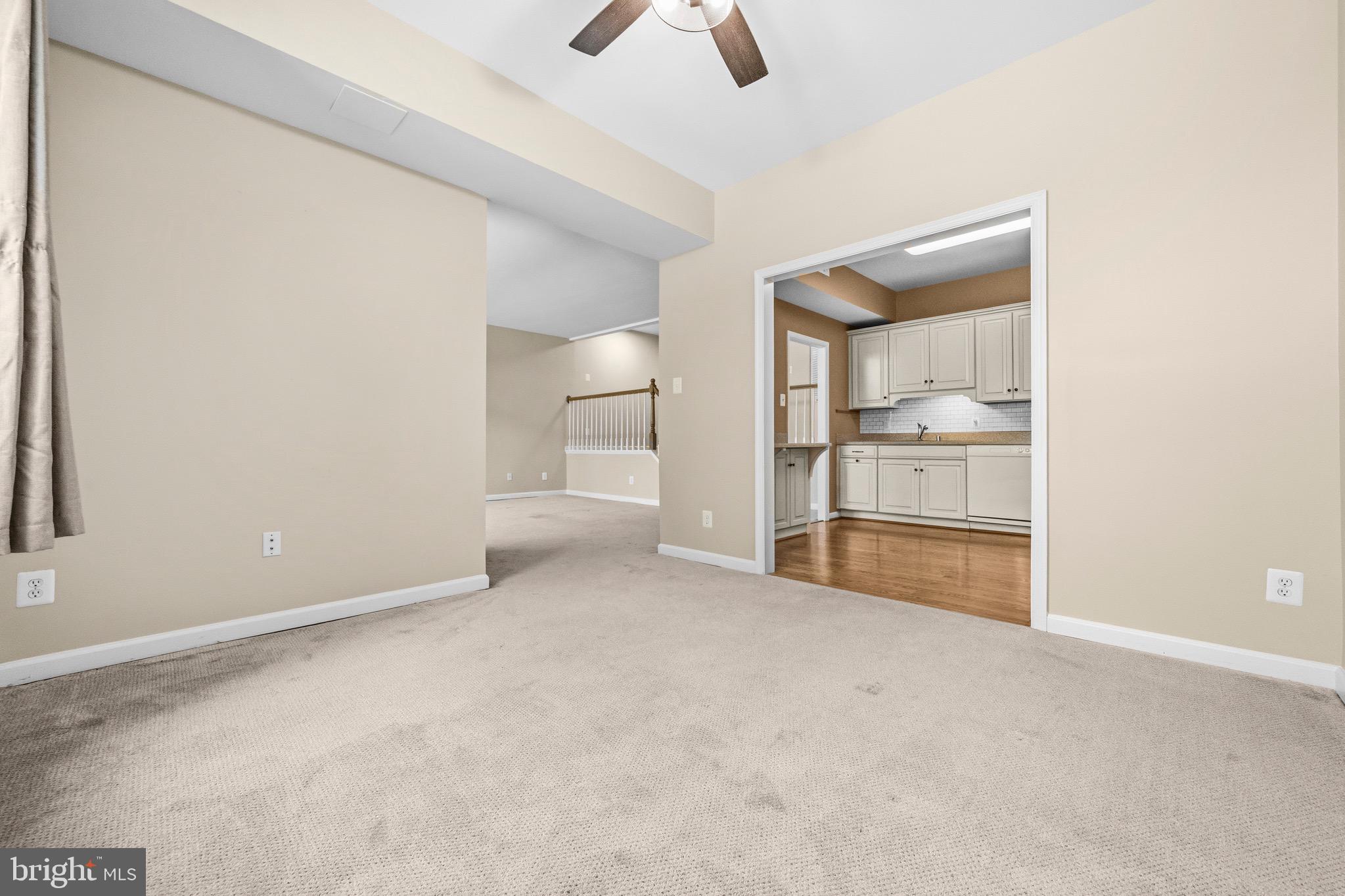 2116 Green Watch Way, Unit 200D Reston, VA 20191 - Photo 13 of 38 an empty room with chandelier fan