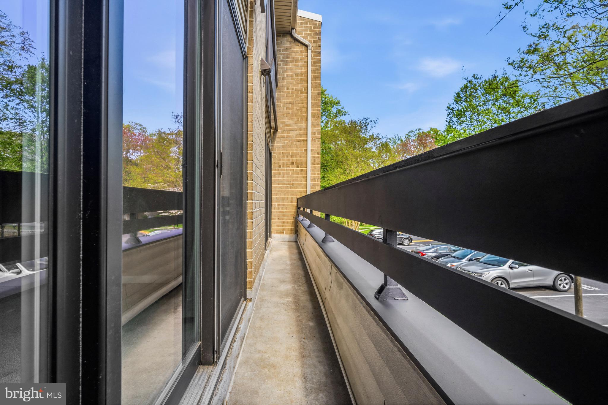 2116 Green Watch Way, Unit 200D Reston, VA 20191 - Photo 30 of 38 a balcony with view of an outdoor space