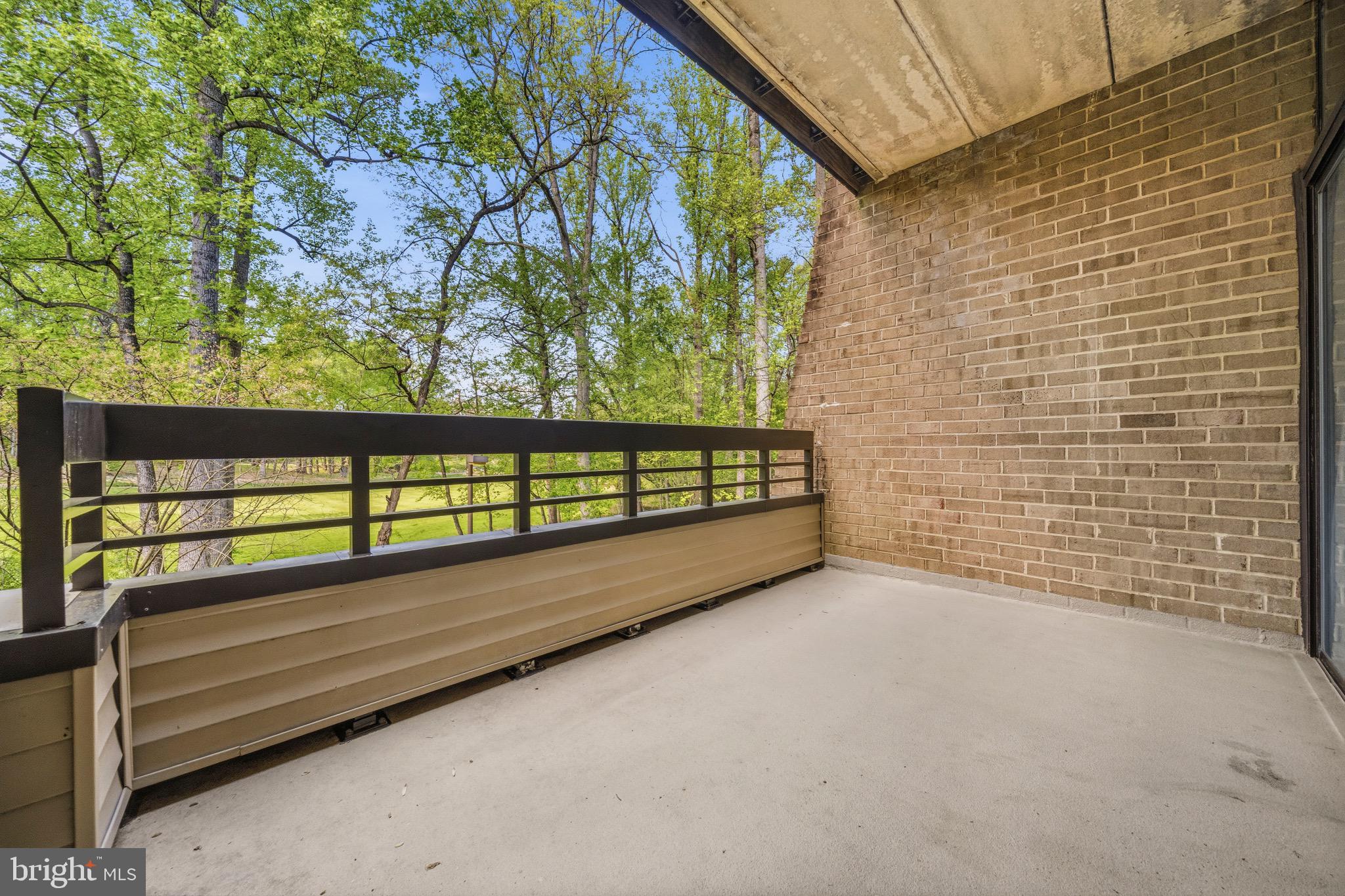 2116 Green Watch Way, Unit 200D Reston, VA 20191 - Photo 33 of 38 a view of a bench in the balcony