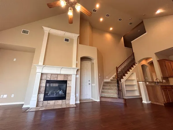 a view of an entryway with wooden floor