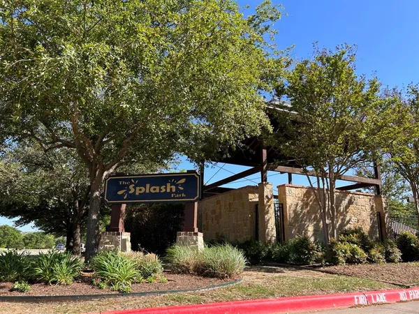 a view of a balcony with a pot