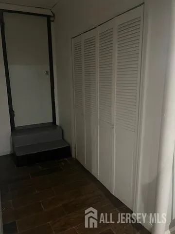 a bathroom with a shower and a toilet