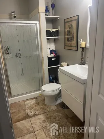 a view of a livingroom with wooden floor