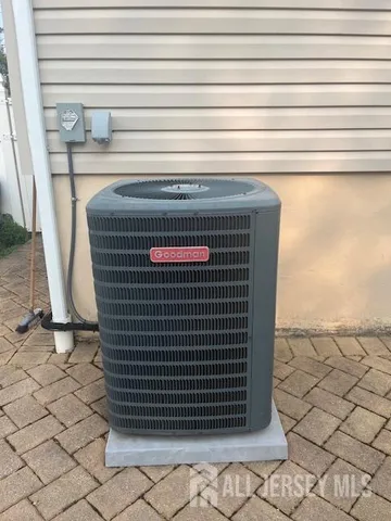 a outdoor dining space with furniture and outdoor view