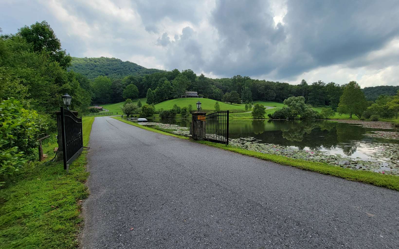 23 Oak Ridge Road Hayesville, NC 28904 - Photo 16 of 17 a view of a lake with a big yard