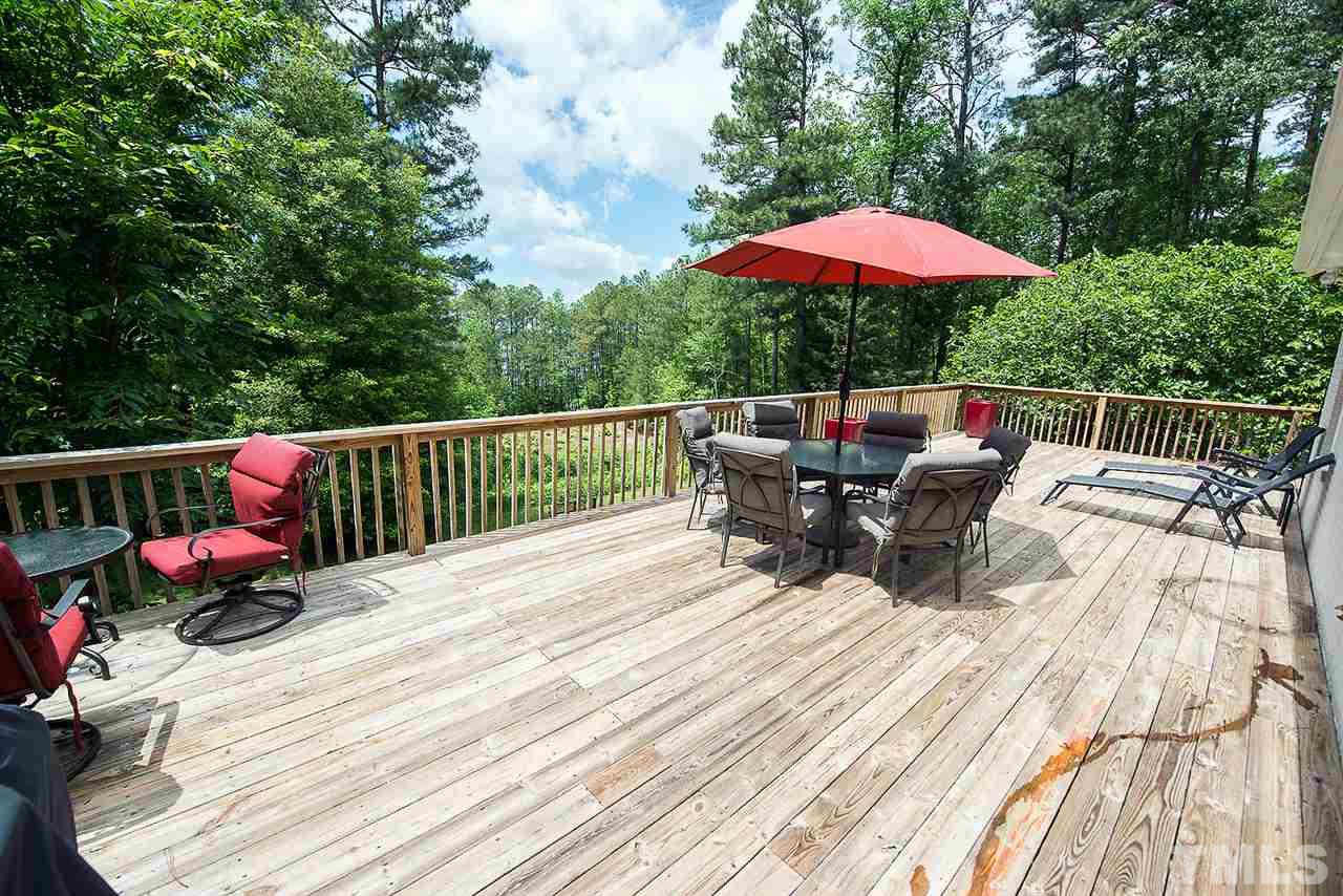 6820 Lake Wheeler Road Raleigh, NC 27603 - Photo 16 of 25 Picture yourself sitting on the deck of your acre lot, watching the sunset on the lake as you sip your iced tea!